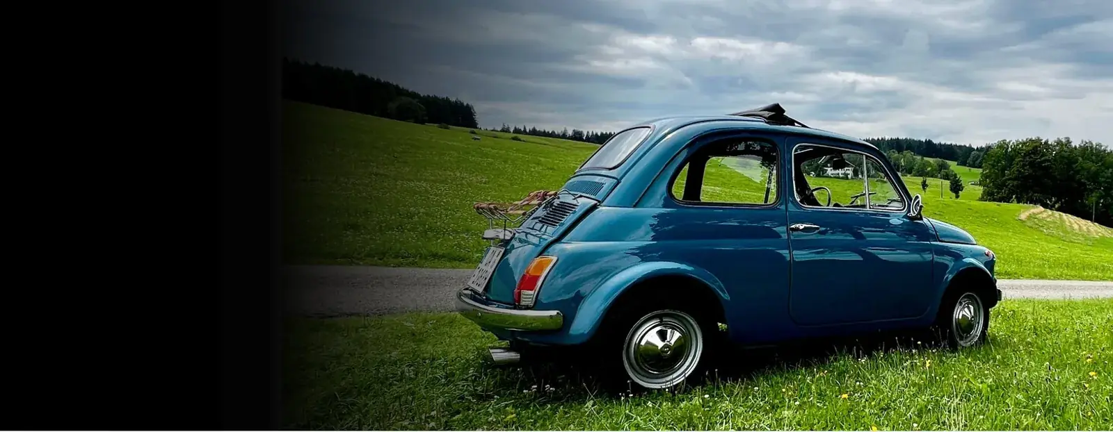 Fiat 500 im Sonnenuntergang – Young- & Oldtimerbetreuung Allgäu